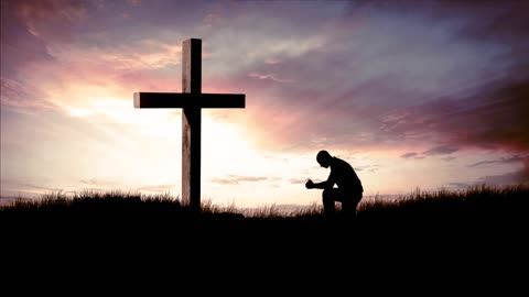 Man Kneel At Cross To Pray