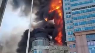 In Tianjin, China, a colossal fire has engulfed the Xintiandi office building.