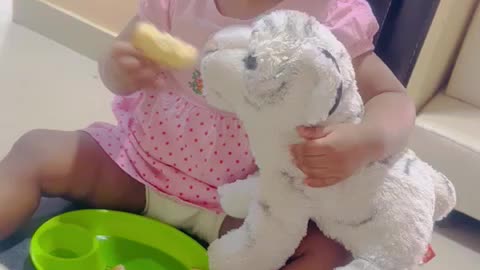 CUTE BABY FEEDING HIS TIGER