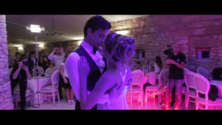 Professional dancers pull off dazzling routine at their wedding
