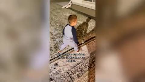 'Magical' moment little boy sees snow for the very first time