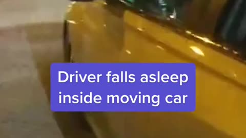 Driver falls asleep inside moving car