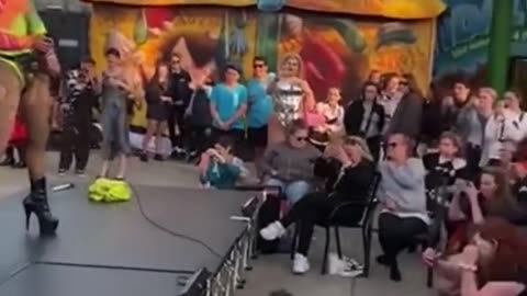 Drag queen simulates sex acts in front of children at an “all ages family-friendly” in Uk