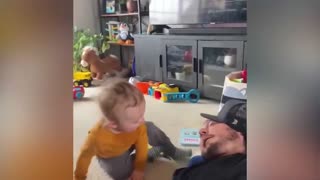 Dad makes baby laugh hard by making funny sound