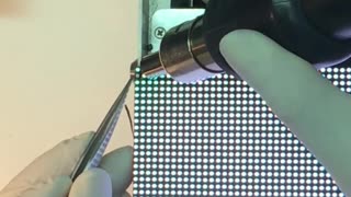 Professional technicians are repairing damaged LED modules