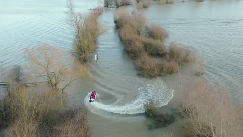 Jet Skiers using the A1101 Welney on the Norfolk Cambridgeshire border after flooding