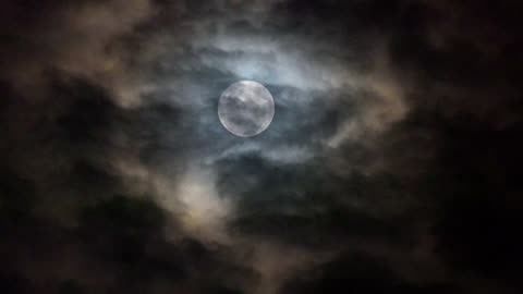 Mystical Nocturnal Symphony: Moon and Clouds in the Night Sky