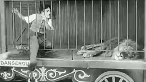 CHARLIE CHAPLIN IN THE CAGE