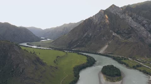 Aerial view of a valley between the mountains