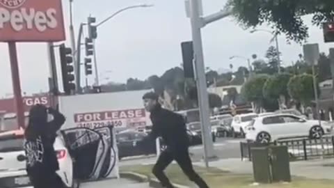 Road Rage between 2 passengers from the same vehicle.