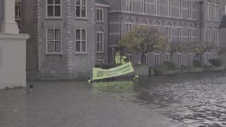 Dutch Greenpeace activists protest against Wilders