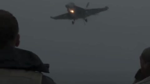 The F-18 landed in rainy weather