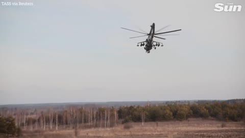 Russian combat helicopter evacuates crew of damaged Kamov Ka-52 attack helicopter