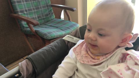 Baby accidently performs the "spit and slurp"