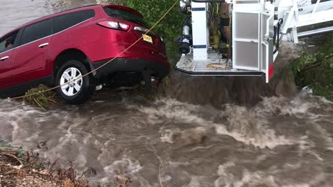 Portales Fire Department Saves Family From Car Swept by Floodwaters