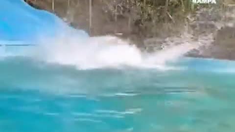 Sliding down the water slide