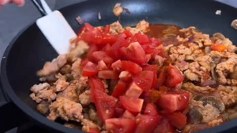 Add The Chopped Tomatoes And Red Peppers