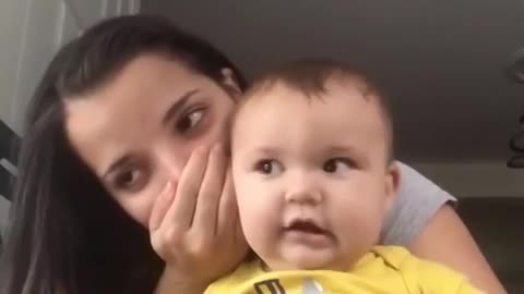 Baby Laughs Adorably When Mom Whispers In His Ears