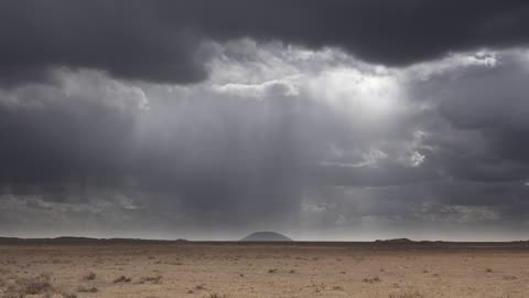 Rainstorm clouds approaching the desert