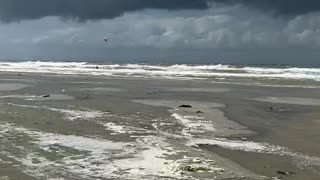Insane jump of kite surfer.
