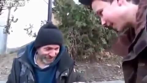 A kid from Ukraine performs a magic trick with coffee for a homeless guy