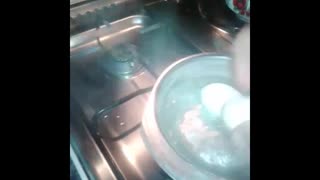 take eggs from boiling water