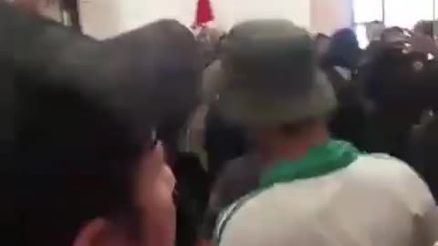 Protesters storm the Presidential Palace in Baghdad, Iraq.