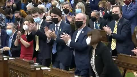 Fully masked Canadian parliament standing ovation after a live stream speech from Ukraine's Zelensky