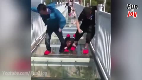 People are terrified to cross glass bridge | Glass bridge crack effect | Glass bridge funny moments