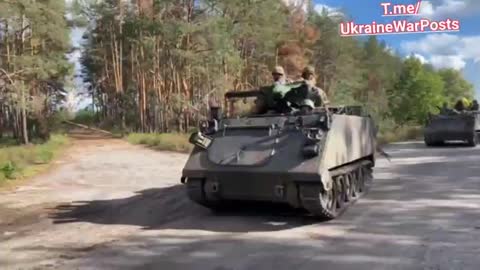 Column of Ukrainian M113 APCs on the move