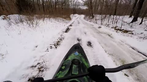 Adventurous Daredevils Ride Kayak Down An Icy Mountain