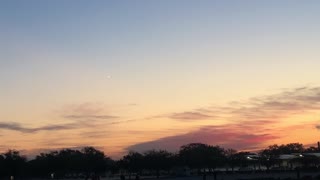 Meteor Streaks Across Sunrise Sky
