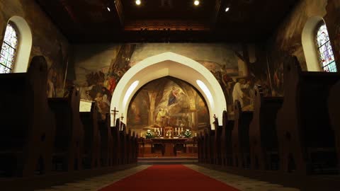 Church Interior 1 Tracking shot of the inside of a church - tracking up the aisle.