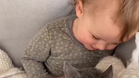 Baby and cat spending quality time together