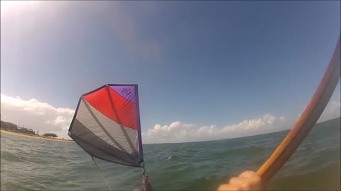 Kayak paddling/sailing on the bay