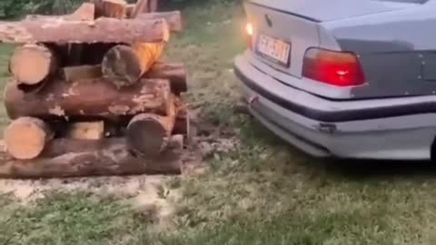 Funny Video of starting a campfire with a car exhaust