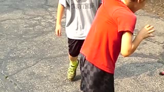 Boy Tries To Race With Shirt Attached To Gate