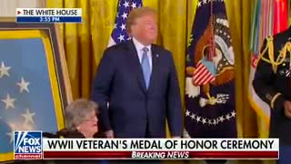 Trump has tender moment and laugh with Medal of Honor recipient's widow