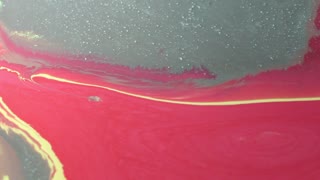 Nicely Done Video of a Red Ink Flowing in a Flat Surface.