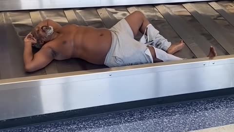 Baggage Claim Confusion! This Man Found a Unique Sleeping Spot (Hilarious!) #RumbleShorts