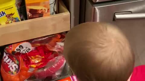 Kid Gets Caught In The Act Of Stealing Halloween Candy