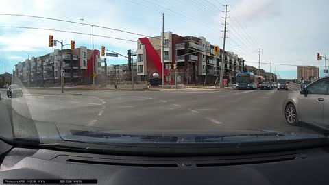 Idiot on intersection at Winston Churchill Blvd and Eglinton Ave, Mississauga, 2021-03-06 14:18