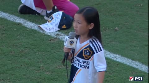 7 Year-Old Amazes Audience When Performing the National Anthem