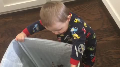 Tot Boy Eats Pudding Out Of Brand New Trash Bag