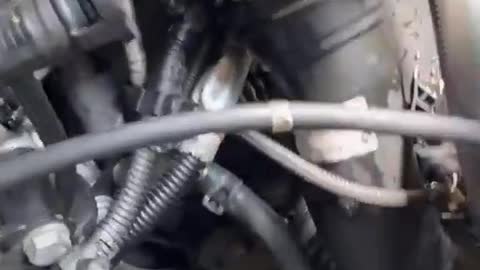 I added antifreeze to the BMW and found a leak in the pipe underneath