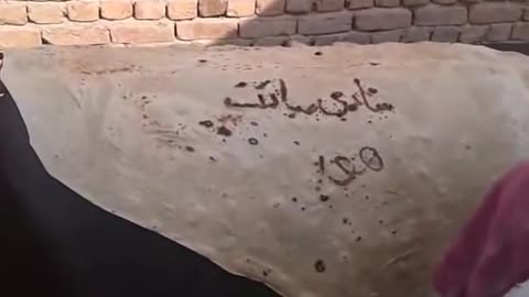 Have you ever seen such a big and thin bread (chapati) with Shadi Mubarak writing on?