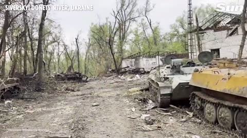 Ukranie ground forces inspect column of russia tanks destroyed near