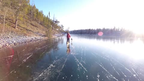 Ice Skating On A Crystal Clear Lake In Sweden