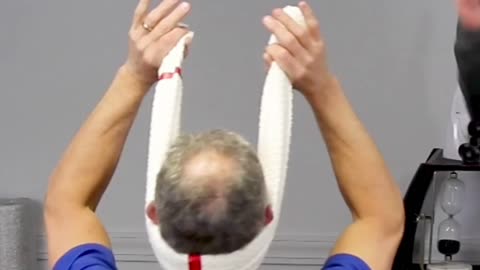 Decompress neck using rolled up towel