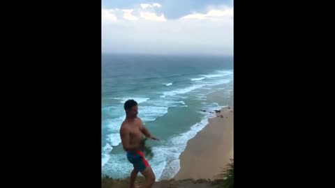 Aussies create 'natural boomerang' by throwing and catching sticks off cliff on windy day